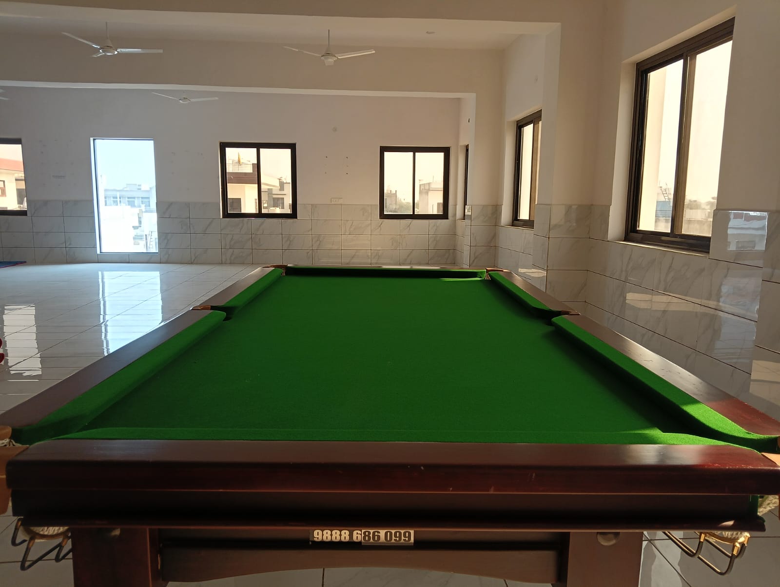 Recreation room with billiards table